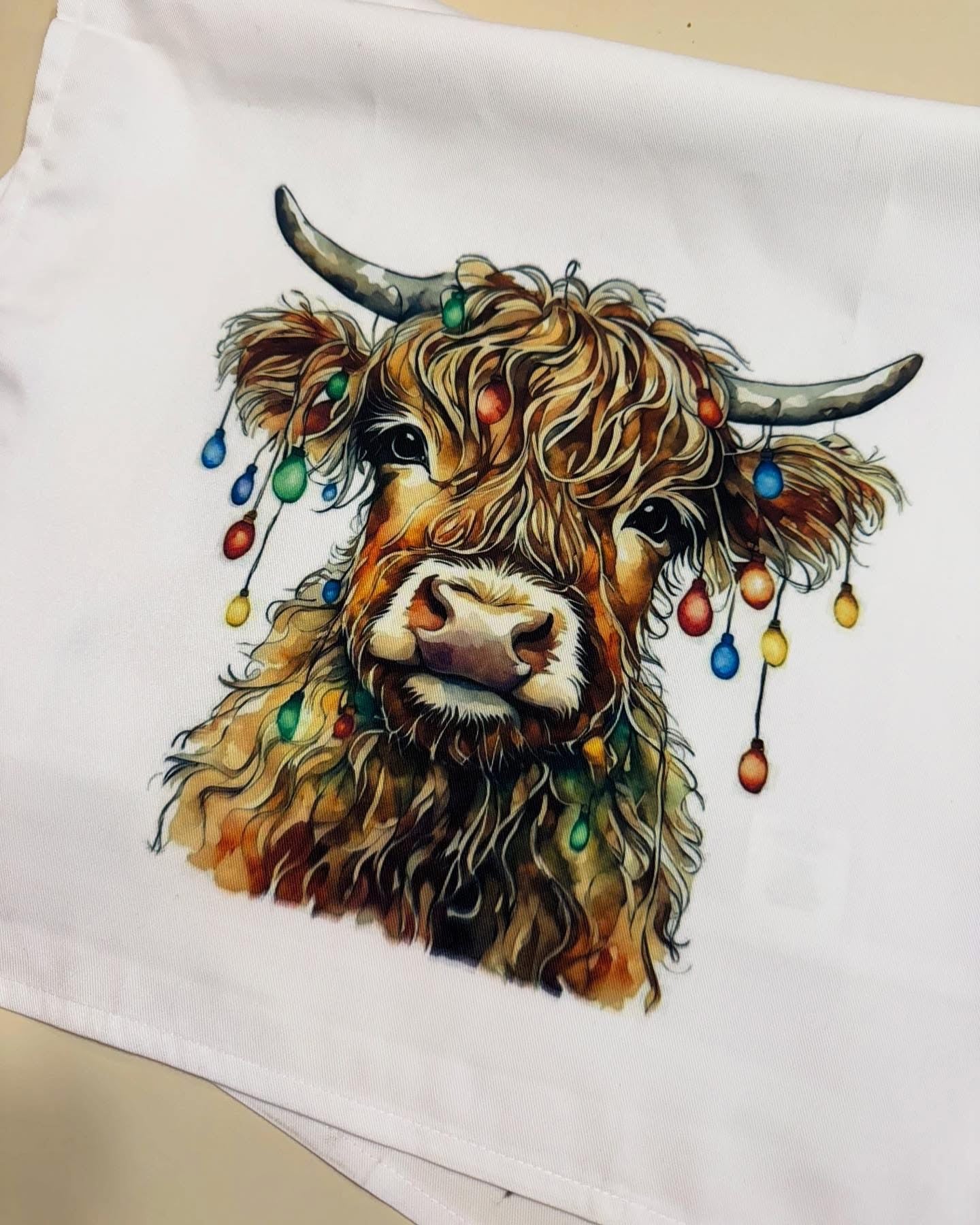 Christmas Tea Towel with Festive Cow and Lights